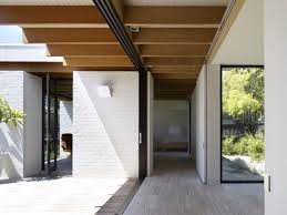 Hampton Australia Modernist Neutra Ellwood Kennedy Nolan Minimal Simplicity Sliding Doors Travertine Beams Hamptons House Architecture Clinker Brick