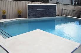 Swimming Pool With Feature Wall And Water Feature Modern Pools Pool Pavers Small Pools