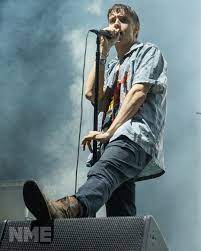 Formed in 1998, the band is composed of singer julian casablancas, guitarists nick valensi and albert hammond jr. On The Cover The Strokes Journalists Kiss Your Ass To Your Face And Talk Shit When They Re Writing The Article