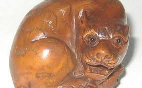 Japanese netsukes are small toggles once used to attach pouches or cases to kimono sashes. Lot Art An Early 20th Century Japanese Carved Ivory Netsuke As A Sleeping Cat Signed To Base 15 Cm Long
