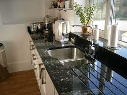 Granite countertops pros and cons, emerald pearl granite kitchen countertops white kitchen cabinets granite countertop. 8 Emerald Pearl Kitchens Ideas Emerald Pearl Granite Kitchen Granite