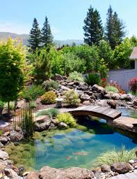 Koi Pond Designed By Saunders Designs Best Of The Garden Beautiful Home Gardens Fish Pond Gardens Pond Landscaping