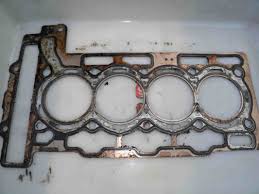 How To Diagnose A Blown Head Gasket When Coolant Causes Misfires