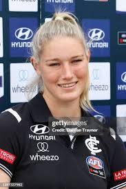 Carlton AFLW players Grace Egan, Tayla Harris and Lucy McEvoy pose... News  Photo