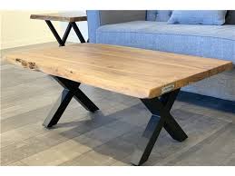 There are a lot of live edge epoxy and resin tables. 40 Live Edge Coffee Table With Black X Legs Corcoran Importation