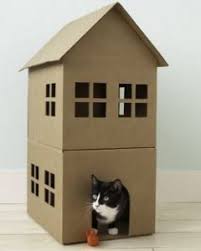 Fabriquer Un Arbre A Chat 6 Idees Faciles Et Pas Cheres Maison De Chat En Carton Maison De Chat Maison Chat