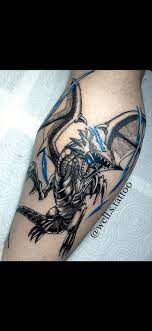 Blue eyes white dragon tattoo