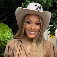 Whether it's her day in the sun, her afternoon with blooming flowers, or an  evening in the lights, swyd and share your Happy Birthday wishes with our  mother, and wife Dr. Kimberly!