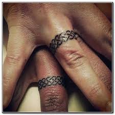Celtic Love Knot Ring Tattoo Ring Tattoo Designs Ring Finger Tattoos Wedding Band Tattoo