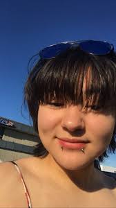 Where is Johnny changing the baby's diaper? On the toilet? lol