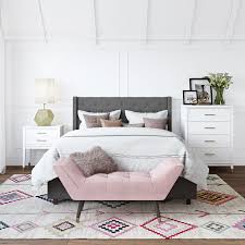 Set on four walnut finished legs which elevate the drawers from the floor, this storage nightstand of slanted drawers are a great addition to any bedroom. 36 Best Bedside Tables For Every Home