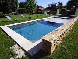 l esprit familial par l esprit piscine 10 x 4 m escalier d angle interieur revetement gris anthracite margelles en pier stone pool pool house outdoor decor