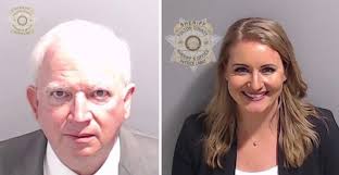 Eastman, other defendants in Fulton 2020 election probe start to surrender  at county jail