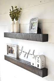 The wall shelves behind the sofa are a nice touch and can hold various decor pieces. Pin On Products