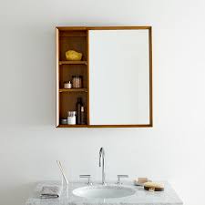 Bathroom cabinets are a vital part of any design, as adequate storage ensures your new bathroom looks beautifully clutter free and is also a practical space. Mid Century Bathroom Cabinet With Shelves West Elm United Kingdom