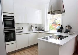 And then there's the slick green splashback, which injects colour, life and a modern edge to the space. Small U Shaped Modern Kitchen Design Ideas Novocom Top
