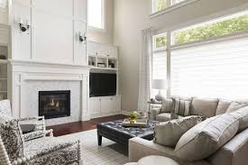Would prefer to eliminate both areas above fireplace but now sure of the best. Two Story Woodbury Living Room Fireplace Design Ispiri Projects