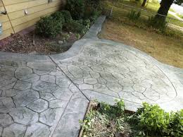 After debating quite a bit about color and pattern, we chose a light tan/brown combination in a pattern called arizona flagstone. Stamp Concrete Random Stone Gray Blue Mix With A Seemless Stone Border Slate Green Patio Flooring Backyard Patio Concrete Art