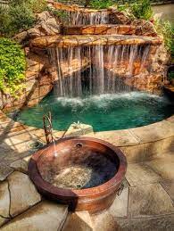 We service what we sell and stock/ship a wide variety of hot tub parts for most brands. Backyard Oasis With Hot Tub And Waterfall Pool Via Garden Backyard Oasis Backyard Pool Backyard