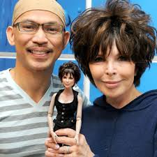 Custom repainted doll I created of famed lyricist, songwriter and artist  Carole Bayer Sager. These photos were taken at her art studio in her home  in Bel Air, Los Angeles. She co-wrote