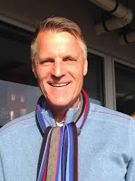 Horizon Services co-owner, Mark Aitken, overlooks a Baltimore Ravens game.