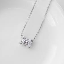 From a sweet and romantic diamond heart to a stunning, canary yellow diamond pendant, we have something to satisfy everyone's personal taste. East West Emerald Necklace