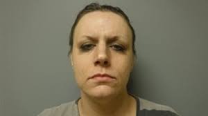 Police: Woman stole man's wallet while he showered