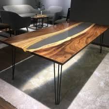 This table also has some very large filled splits and will bring real warmth to any room. Wood Studio Custom Furnitures
