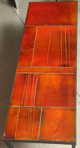 table navette ceramique emaillee et fonte orange roger capron annees 50 60 ceramique emaillee table basse mobilier de salon