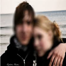 Causally Motivated Shortcut Removal Using Auxiliary Labels