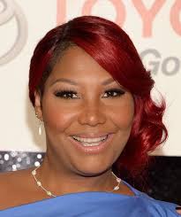 Traci Braxton 2025: Husband, net worth, tattoos, smoking & body  measurements