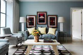 A modern eclectic space with a touch of coastal themed living room theme, this interior design focuses on simple finishes with prominent textures such as linen fabrics, solid wood furniture pieces and deep blue accents, helping bring in the seaside feel similar to the view in the balcony. Blue Grey Living Room Colour Scheme Interior Design Ideas House Garden