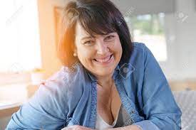 I turned 50 this year, and have lost 55lb, and can now fit into the tuxedo i wore when i was 22. Portrait Of Smiling 50 Year Old Woman Stock Photo Picture And Royalty Free Image Image 74768966