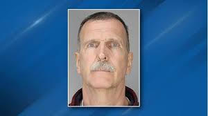 A witness told investigators a car intentionally swerved into the  motorcycle's path in Aurora.