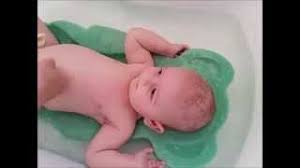 Drizzle under running water while filling the bath. How To Bathe A Newborn Baby Using Lumay Baby Bath Sponge Support Youtube