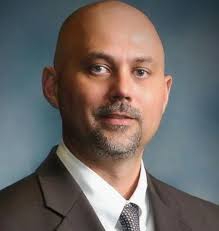 Fall From Grace" School Superintendent put