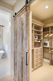 Solid wood with a medium stain and black hardware. Barn Door Inspiration 40 Amazingly Creative Ideas