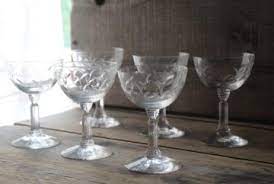 The glass stopper is amazing with three graduated orbs this piece is unsigned, etched with the number 24 under the rim. Vintage Crystal Stemware Bar Glasses