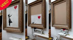 Banksy artwork shredded after selling at auction may have increased in value. Banksy Committed Criminal Damage With Auction Sale Shredded Artwork Stunt Bristol Live