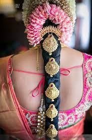 Most Gorgeous South Indian Brides We Re Crushing On With Some Serious Hair Goals Indian Bridal Hairstyles Bridal Hairstyle Indian Wedding South Indian Bride Hairstyle