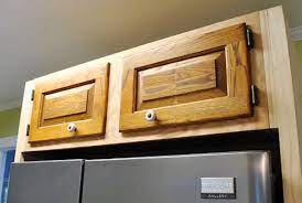 To build a kitchen cabinet, start by cutting the side and bottom panels out of some mdf or plywood. Cutting Down A Few Cabinet Doors To Fit Young House Love
