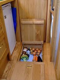 Cool Underfloor Storage For Veggies Etc Similar Idea To The Underfloor Fridge Idea To Connect With Us Tiny House Storage Tiny House Kitchen Diy Tiny House