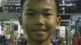 Thai cave drama: rescued boys wave for camera from hospital beds