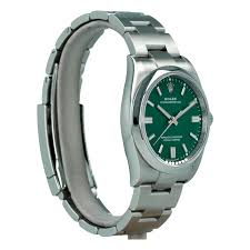Rolex built just about all of their watches using this oyster case and perpetual winding system as a foundation. Rolex Oyster Perpetual 126000 36mm Green Dial New Model Buy Pre Owned Rolex Watch