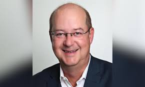 Interest rate rise inevitable, says economist Warren Hogan