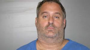 Husband accused of assaulting wife, setting fire to home