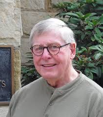 Wheeling Priest Is a Fan of the Cross