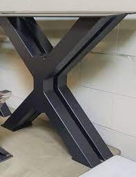 Contemporary round wooden side table with black metal legs. 110 Steel Table Ideas