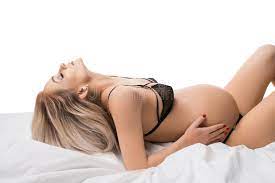 Pregnant Woman Relaxing in Bed Isolated Shot Stock Image - Image of  beautiful, loose: 134815445
