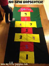 Scoop the rock up as you hop back to the starting point. How To Make A Diy Hopscotch Mat My Little Poppies